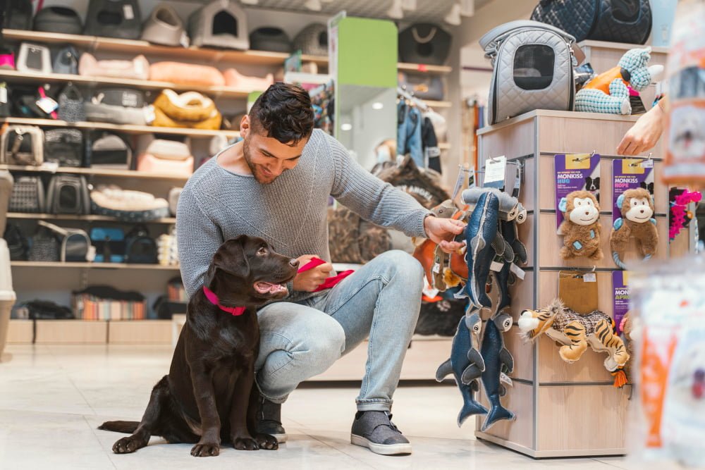 cute-dog-with-owner-pet-shop